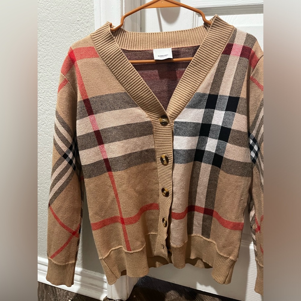 Burberry cardigan women's small. Basically new barely worn. Great condition.
